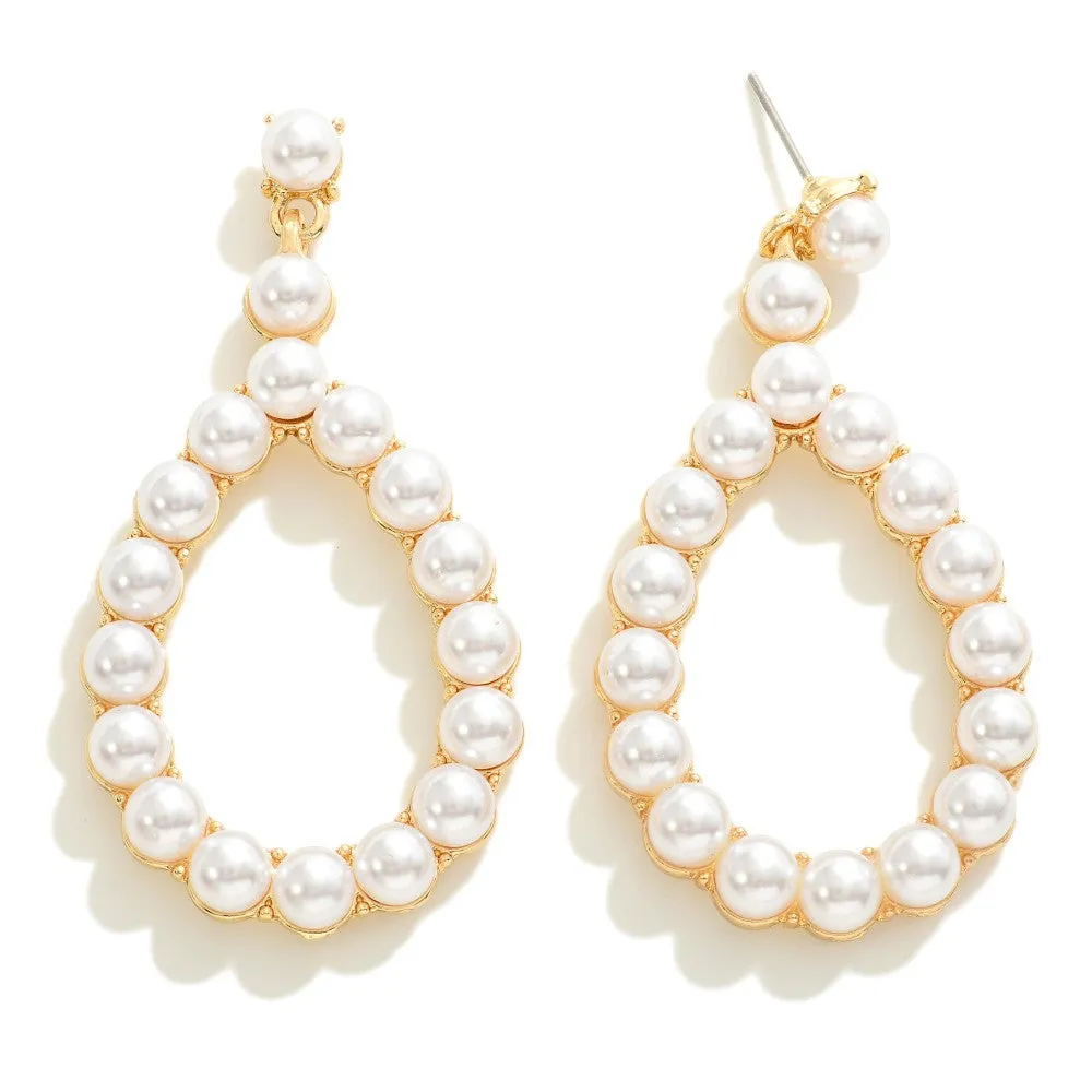 Cody - A Pair of Studded Pearl Tear Drop Earrings